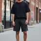 J/bronw Vestige Shorts — Acid Gray — worn by a model, front view