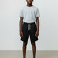 J/bronw Nocturne Shorts — Black — worn by a model, front view