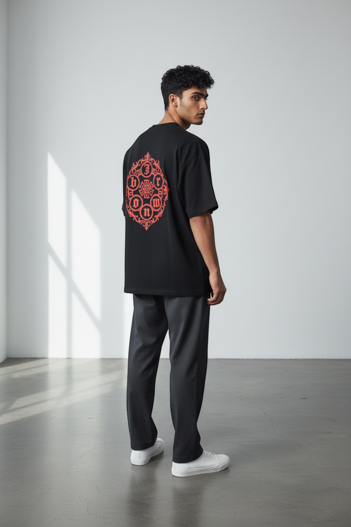 J/bronw Rosette Tee — Charcoal — worn by a model, front view