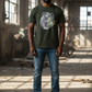 J/bronw Helm Tee — Olive — worn by a model, front view