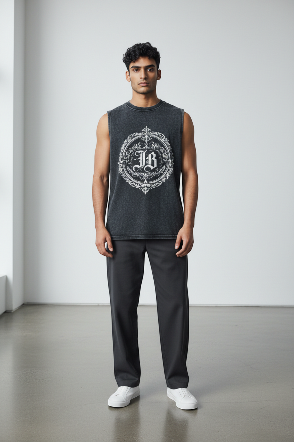 J/bronw Emblem Tee — Black — worn by a model, front view