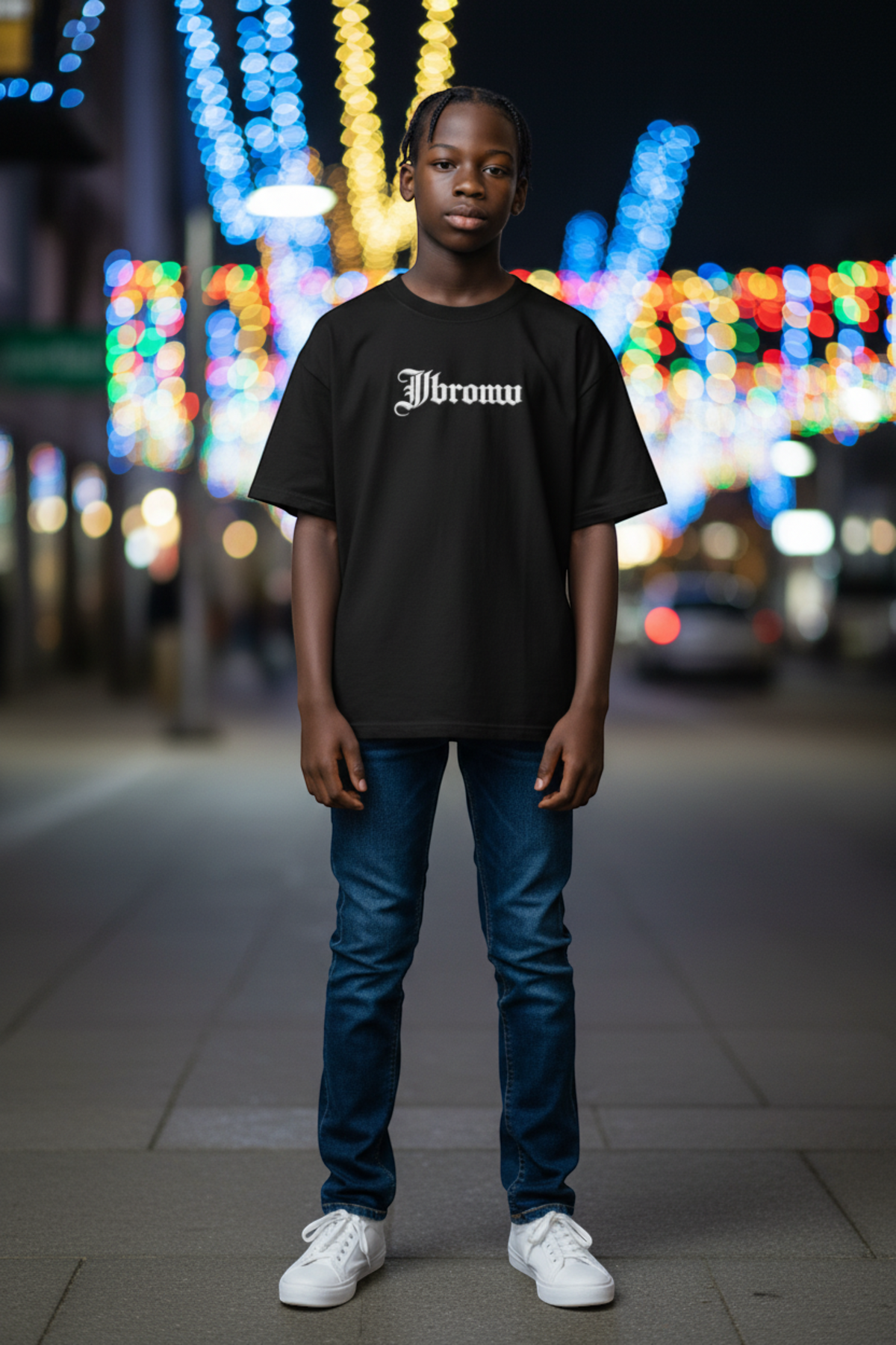 J/bronw Signature Tee — Charcoal — worn by a model, front view